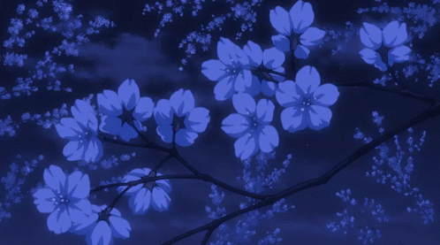 A Bridge With A Tree In The Foreground With Petals Falling From It GIF