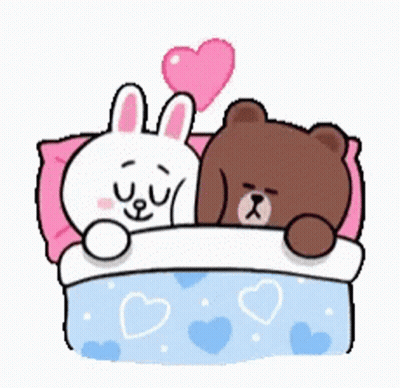 A Brown Bear And A White Rabbit Are Laying In A Bed With Hearts On The Sheets . GIF