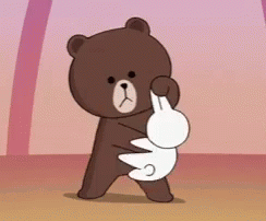 A Brown Teddy Bear Is Holding A White Rabbit In Its Arms GIF