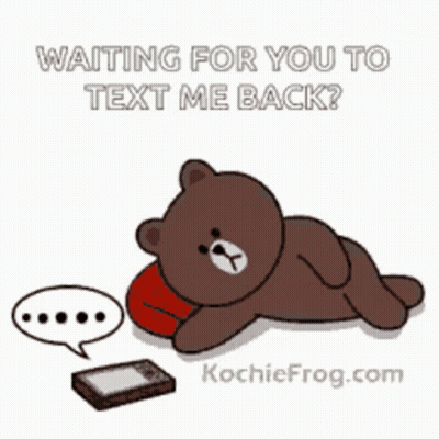 A Brown Teddy Bear Is Laying On A Pillow Next To A Cell Phone With The Words Waiting For You To Text Me Back GIF