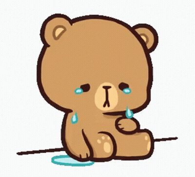 A Brown Teddy Bear Is Sitting On The Ground And Crying . GIF