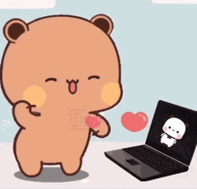 A Brown Teddy Bear Is Standing Next To A Laptop Computer . GIF