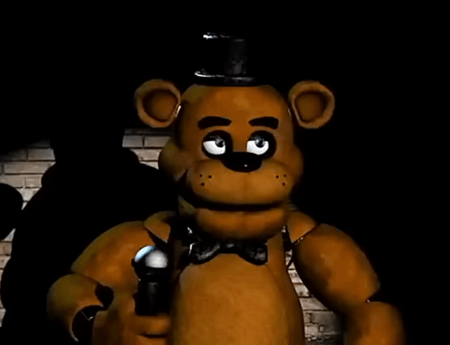 A Brown Teddy Bear With A Black Hat And Bow Tie Is Holding A Microphone GIF