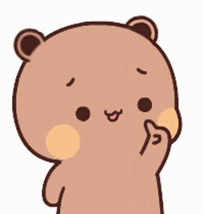 A Brown Teddy Bear With A Yellow Circle On Its Cheek Is Smiling And Holding Up Its Finger . GIF