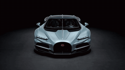 A Bugatti Car Is Shown In A Dark Room GIF