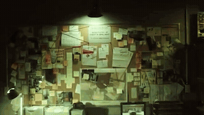 A Bulletin Board With A Lot Of Sticky Notes On It GIF