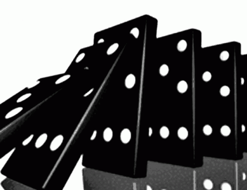 A Bunch Of Black Dominoes With White Dots On Them Are Stacked On Top Of Each Other GIF