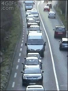 A Bunch Of Cars Are Lined Up On A Highway And The Website 4Gifs.com Is Visible GIF