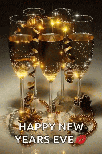 A Bunch Of Champagne Glasses With The Words Happy New Years Eve On Them GIF