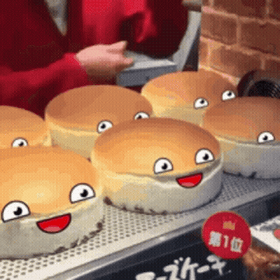 A Bunch Of Cheesecakes With Faces On Them GIF