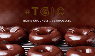 A Bunch Of Chocolate Covered Donuts With The Words Thank Goodness It 'S Chocolate Behind Them GIF