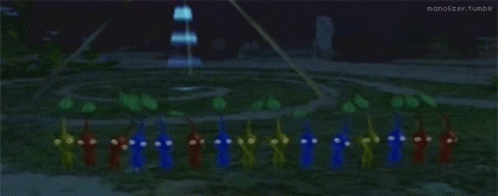 A Bunch Of Colorful Piggies Are Standing In A Circle In A Video Game GIF
