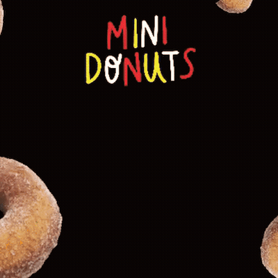 A Bunch Of Donuts On A Black Background With The Word Mini Donuts GIF