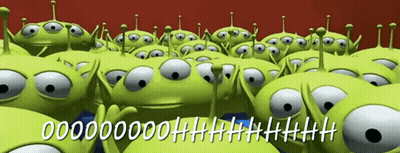 A Bunch Of Green Aliens Are Standing Next To Each Other With A Red Background GIF