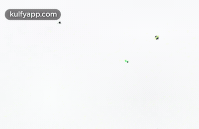 A Bunch Of Kites Are Flying On A White Background GIF