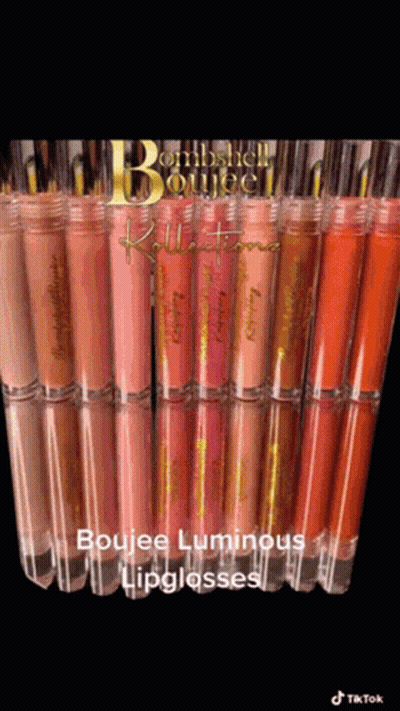 A Bunch Of Lipglosses Are Lined Up On A Table GIF