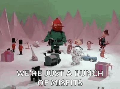 A Bunch Of Misfits Are Standing In The Snow . GIF