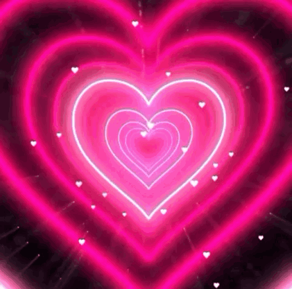 A Bunch Of Pink Hearts Are Glowing On A Black Background . GIF