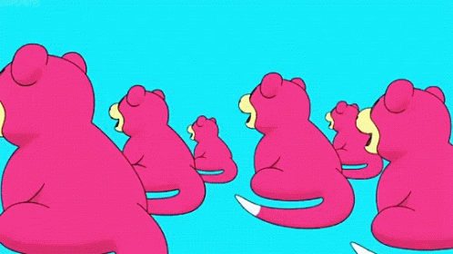 A Bunch Of Pink Stuffed Animals Are Sitting In A Row GIF