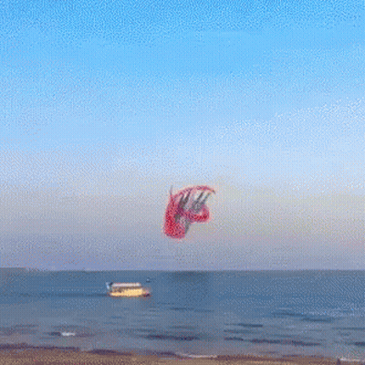 A Bunch Of Planes Flying In The Sky With Smoke Trails GIF