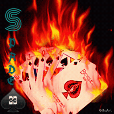A Bunch Of Playing Cards Are On Fire With The Number 23 On The Bottom GIF