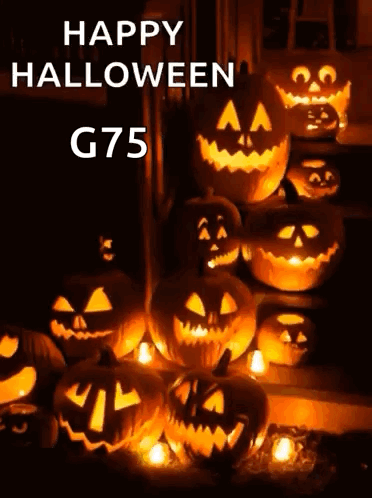 A Bunch Of Pumpkins Are Lit Up With The Words Happy Halloween G75 On The Bottom GIF