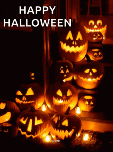 A Bunch Of Pumpkins With Faces Carved Into Them And The Words Happy Halloween On The Bottom GIF