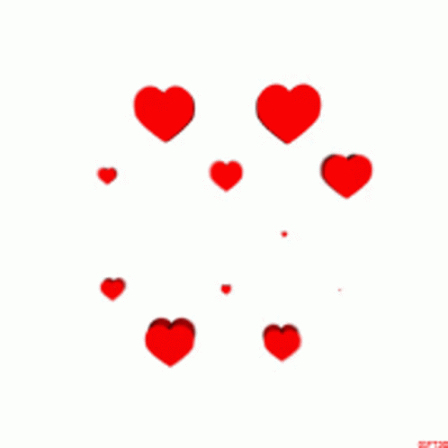 A Bunch Of Red Hearts Are Floating In The Air GIF