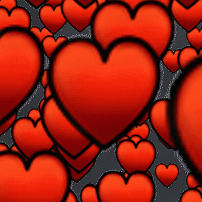 A Bunch Of Red Hearts On A Dark Background GIF
