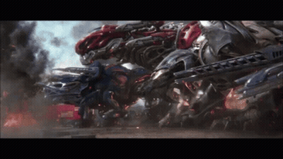 A Bunch Of Robots Are Fighting Each Other With Smoke Coming Out Of Them GIF