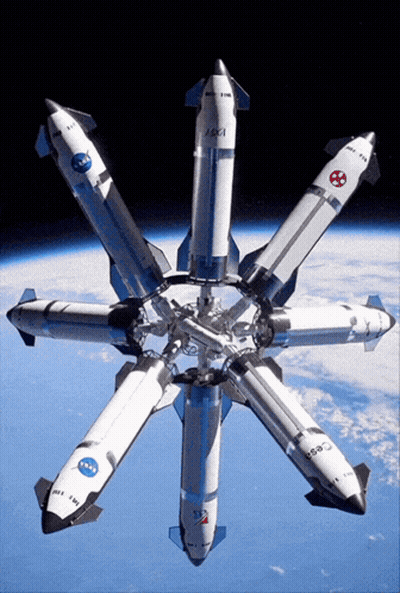 A Bunch Of Rockets Are Lined Up In A Circle And One Of Them Has Nasa On It GIF