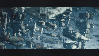 A Bunch Of Space Ships Are Floating In The Sky GIF