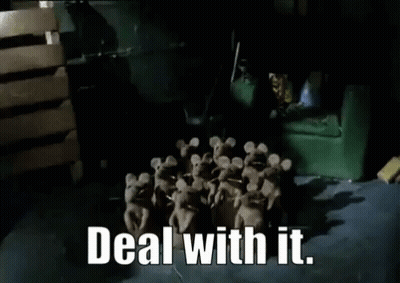 A Bunch Of Stuffed Mice Are Standing Around A Green Chair And Couch . GIF