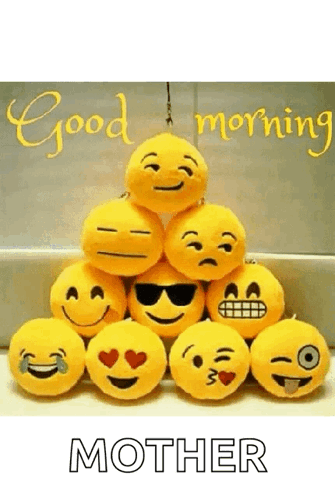 A Bunch Of Stuffed Smiley Faces Are Stacked On Top Of Each Other And The Words `` Good Morning Mother '' . GIF
