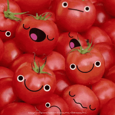 A Bunch Of Tomatoes With Faces On Them GIF
