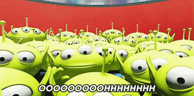 A Bunch Of Toy Story Aliens Are Standing Next To Each Other On A Red Background GIF
