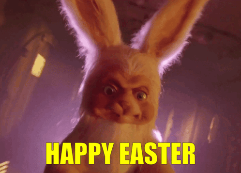 A Bunny Says Happy Easter In Yellow Letters On A Dark Background GIF