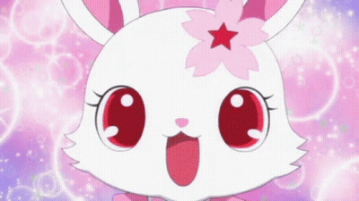 A Bunny With A Pink Flower On Its Head GIF