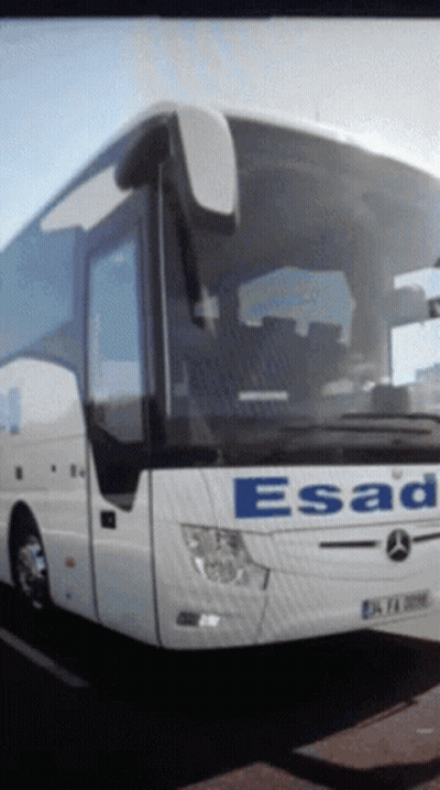 A Bus With The Word Esad On It GIF