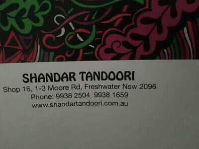 A Business Card For Shandaar Tandoori Has A Phone Number GIF