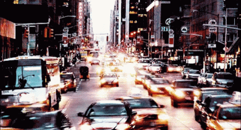 A Busy City Street With A Sign That Says ' Hi ' On It GIF