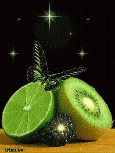 A Butterfly Is Sitting On A Slice Of Lime And Kiwi GIF