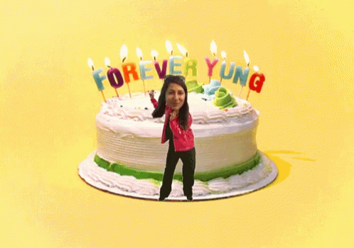 A Cake With Candles That Say Forever Young GIF
