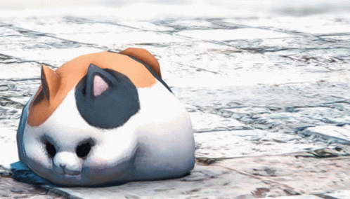 A Calico Cat Is Sitting On A Brick Floor GIF