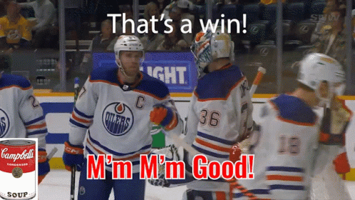 A Can Of Campbell 'S Soup Is Next To A Hockey Player GIF