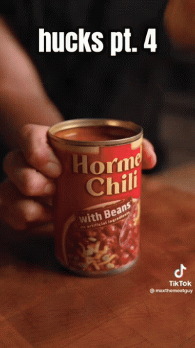 A Can Of Hormel Chili With Beans In Someone 'S Hand GIF