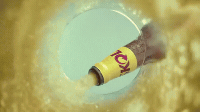 A Can Of Skol Sits On A Table Next To A Glass Of Skol GIF