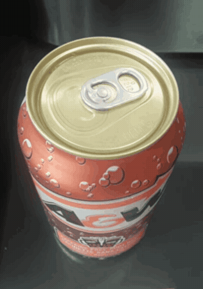 A Can Of Soda With The Top Open And The Number 80 On It GIF