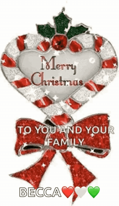 A Candy Cane In The Shape Of A Heart With The Words Merry Christmas To You And Your Family On It GIF