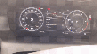 A Car Dashboard Shows The Time As 14:45 GIF